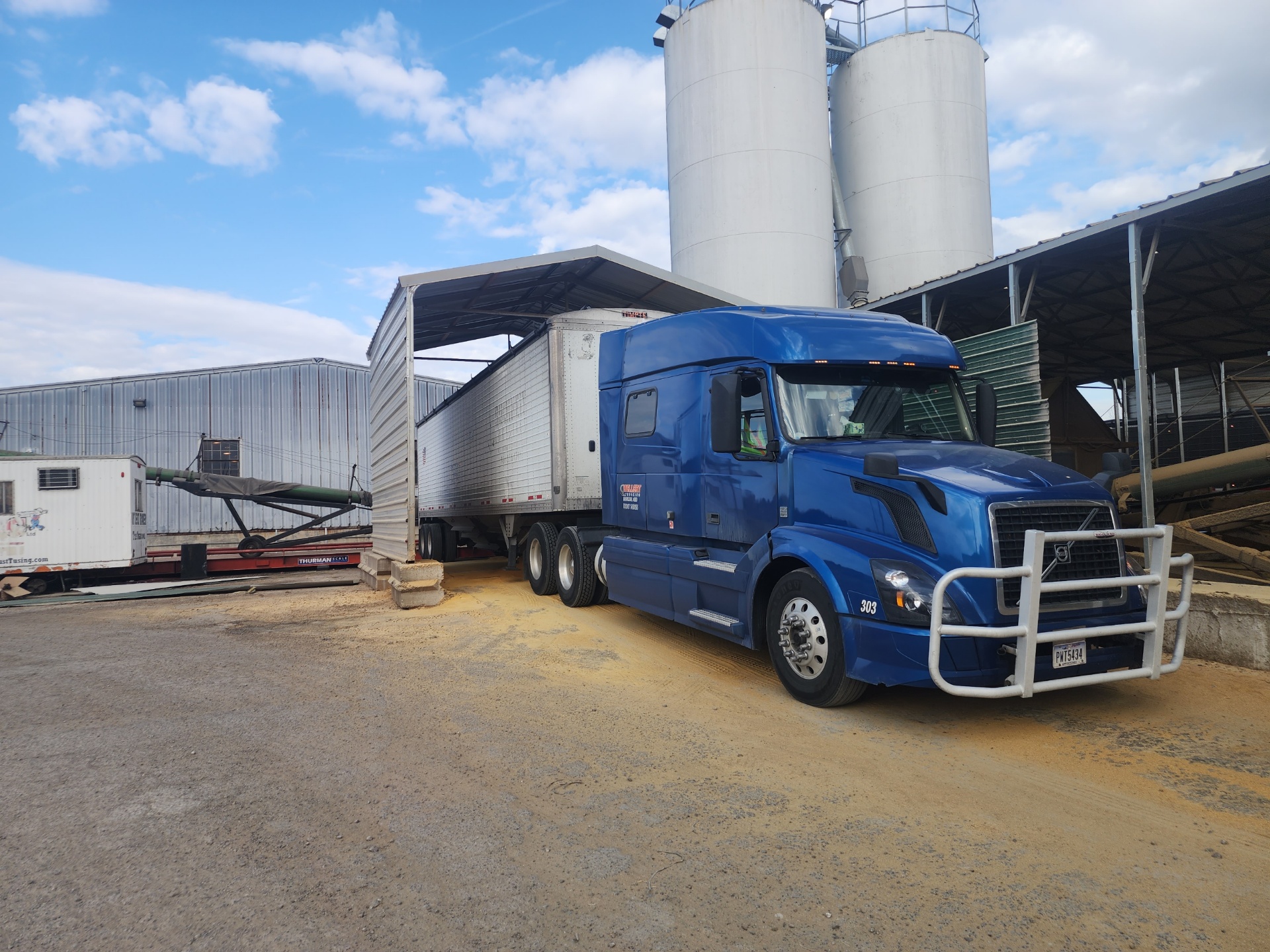 Dry bulk semi-truck at agricultural facility